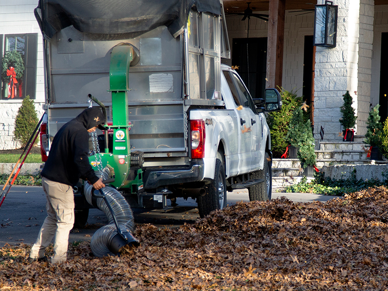 Billy Goat debris loader attached on truck