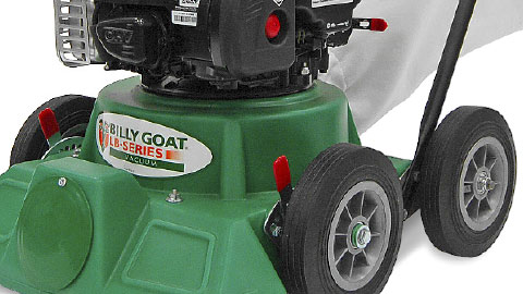 a green tractor with a white label