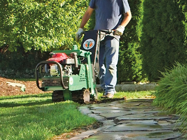 Person using sod cutter