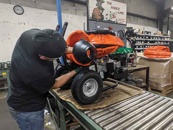 Person using sod cutter