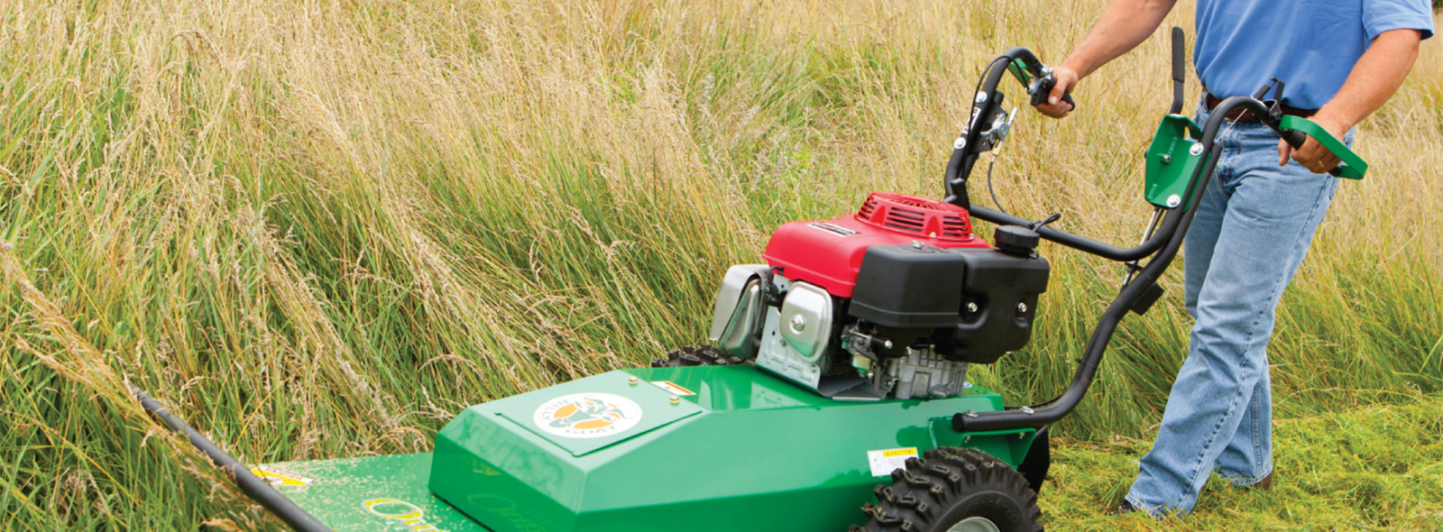 Man using a Billy Goat brushcutter in field